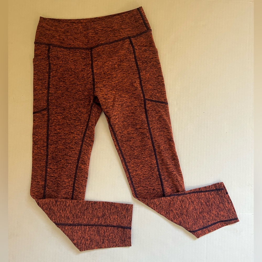 Oiselle Lux coral orange and purple leggings with side pockets size 4